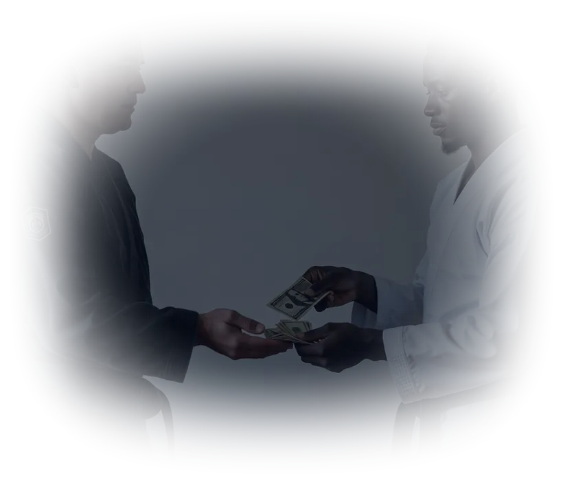 A student handing folded notes to their instructor, both in gi
