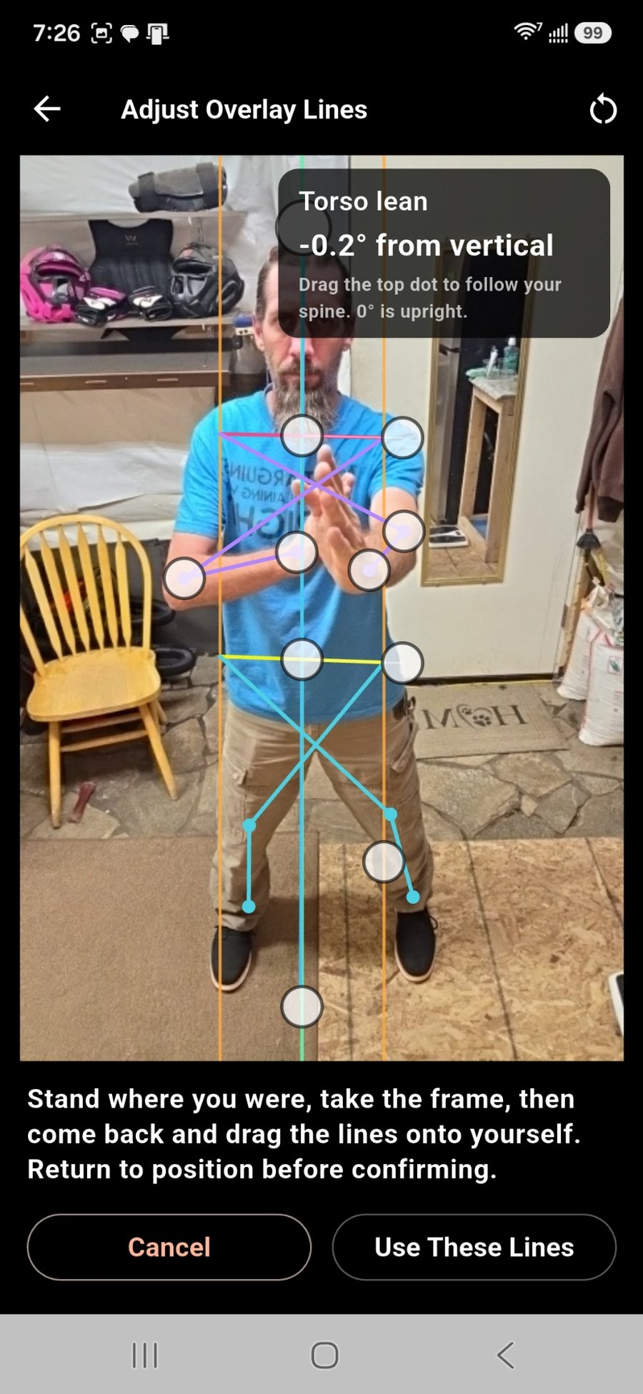 Calibrating the overlay: torso lean read off the student's own body, with handles on shoulders, arms, hips and legs